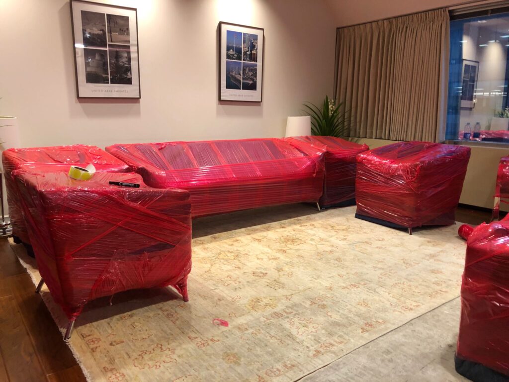 Sofa Wrapped in Red Color Wrap